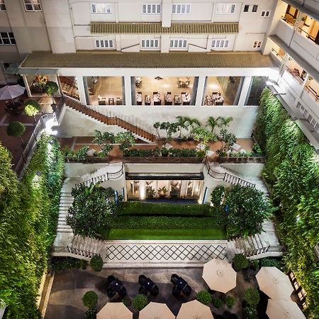 Rex Hotel Cidade de Ho Chi Minh Exterior foto The hotel's courtyard