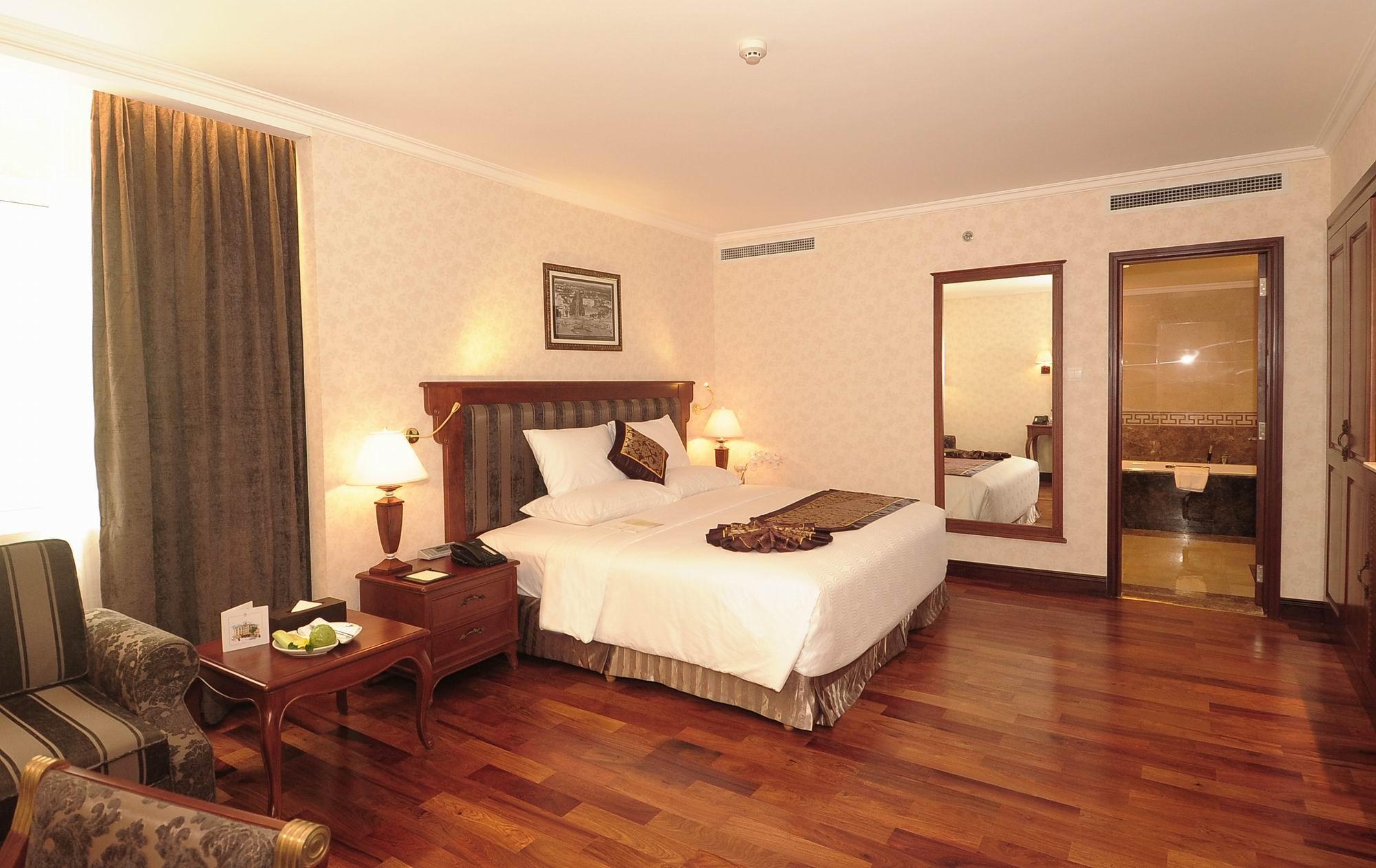 Rex Hotel Cidade de Ho Chi Minh Exterior foto A bedroom at the hotel