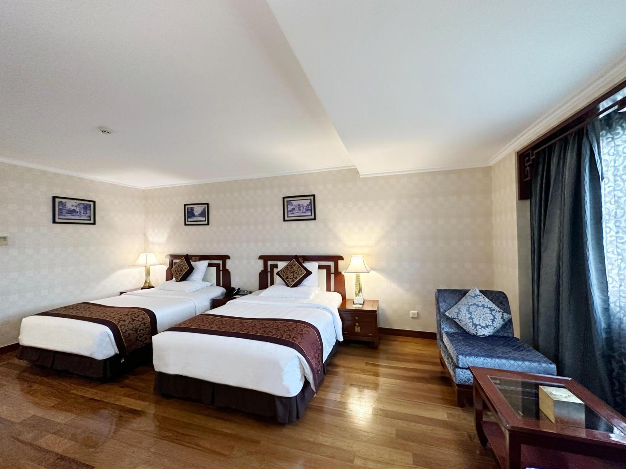 Rex Hotel Cidade de Ho Chi Minh Quarto foto Deluxe Room